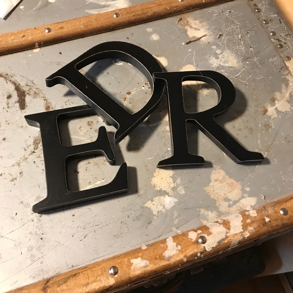 Wooden letters. D.E.R.  Distressed black.